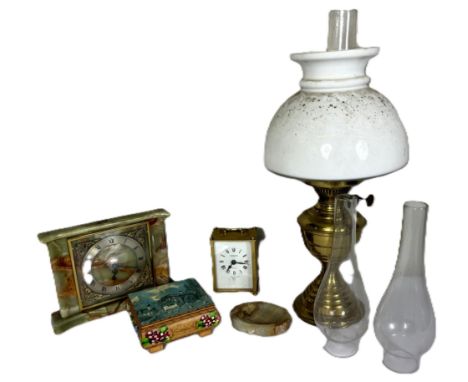 A Duplex oil lamp, 50 cm to top of glass shade, also a onyx clock and dish, a music box, and another clock, (4).
