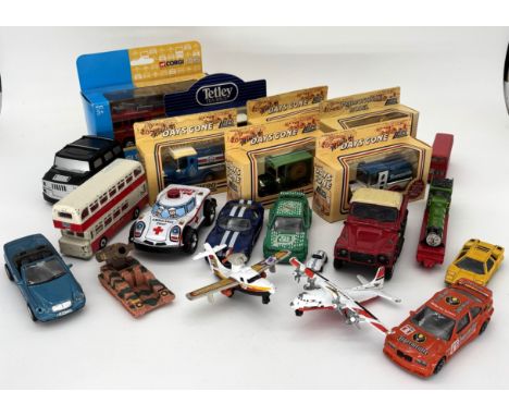 A collection of boxed and unboxed toy cars and other vehicles, to include; Lledo, Corgi, Britains, Dinky, (A Lot).&nbsp;