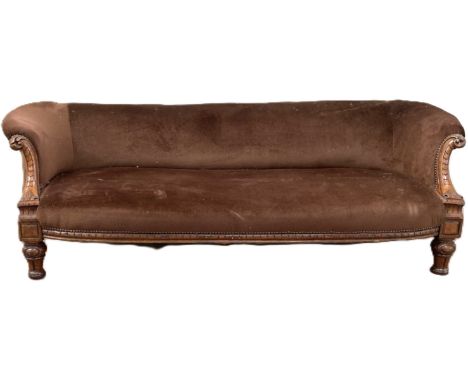 A Victorian sofa with scrolled arms and shaped arms and supports, 60 x 192 x 75 x.