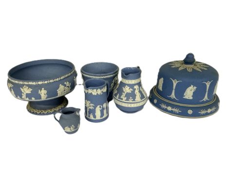 A collection of Wedgewood jasperware, to include, a cheese dome, 16 cm, a flower bowl, three jugs, and vase, (6).