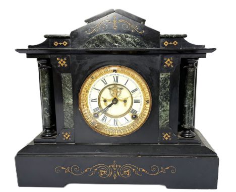 A Victorian slate mantle clock of architectural form with exposed movement to face, marked Ansonia Clock Co, 32 x 37 x 15 cm.