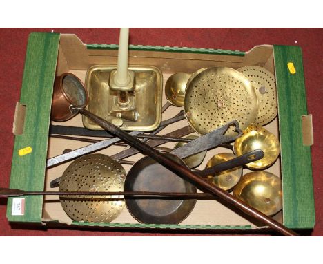 A box of 19th century metalware, to include roasting pans, chamber-stick, and a ladle