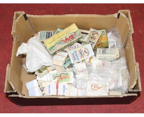 A collection of vintage cigarette cards to include Players and Woodbine
