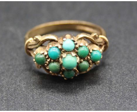 A vintage 9ct gold and turquoise set lozenge cluster ring, sponsor GL&amp;S, 3.8g, size O/P