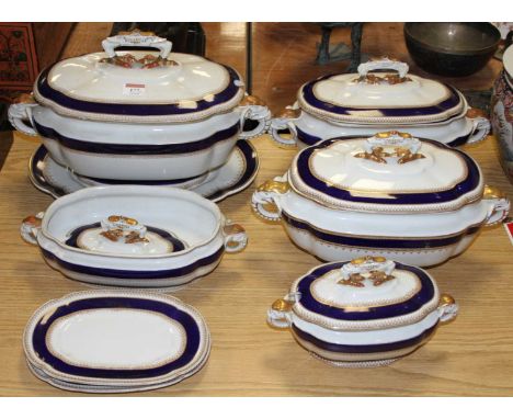 A collection of Royal Worcester tureens, each flanked by elephant mask handles, largest width 39cm (a/f)