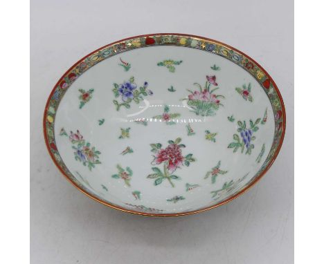 A Chinese porcelain bowl, enamel decorated with flowers, dia,. 28cm