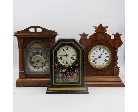 An early 20th century 8-day mantel clock, the enamel dial showing Roman numerals, height 38cm, together with two further mant