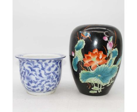 A Chinese famille noir jar, decorated with a kingfisher amongst flowers, height 28cm, together with a Chinese blue &amp; whit