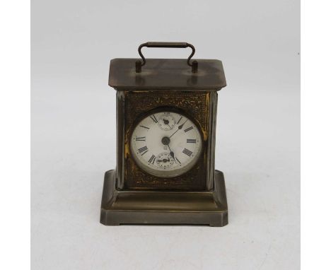 An early 20th century continental base metal cased carriage clock, the circular enamel dial with Roman numerals and two subsi