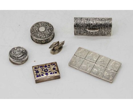 A continental silver eight division pill box with floral engraved decoration, import marks for London, together with four whi