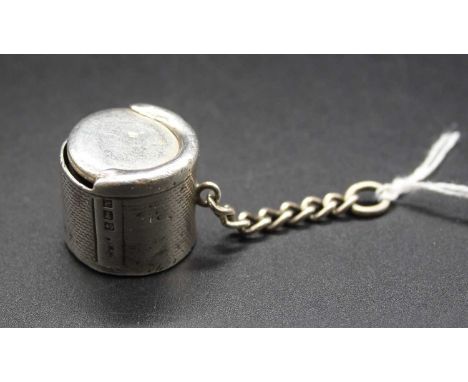 A silver half sovereign case, with engine turned decoration, maker William Manton, Birmingham 1962 (worn)