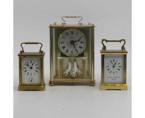 A brass cased carriage clock, the enamel dial showing Roman numerals with subsidiary seconds dial, having visible platform es