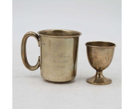 A George VI silver christening mug of plain cylindrical form, Birmingham 1949, maker James Dixon &amp; Sons, together with a 