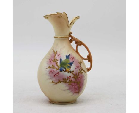 A Locke &amp; Co. Worcester blush ivory jug, decorated with a bluetit, height 14cm