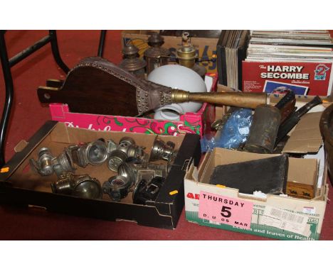 Two boxes of items to include coins, silver plated fish cutlery, stamps, vintage car lamps, and a kukri