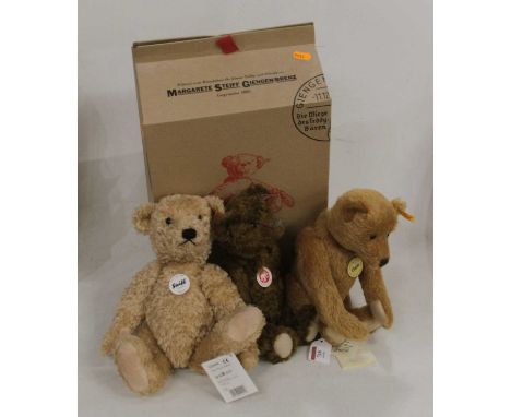 A Steiff Classic bear in brown mohair with button to ear and yellow tag, numbered 028717, with further original booklet label