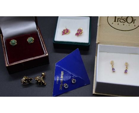 A pair of modern 9ct gold green tourmaline set flower head ear studs; together with a pair of modern Italian 8ct gold blue st