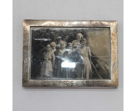 An Edwardian silver photograph frame, London 1908, maker Charles &amp; George Asprey, width 10cm