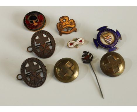 A silver and enamel badge, Queen Mary's Hospital for Children; two British red Cross badges; a Girl Guide pin brooch; brass b