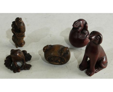 A carved wooden netsuke, frog, 3.5cm high; others, elder, mice in a fruit, dog, beaver (5)