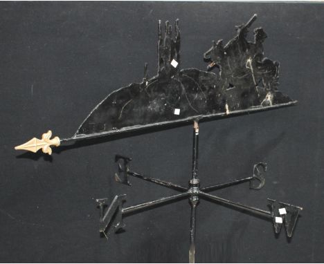 A substantial mid 20th century weather vane, the iron pointer silhouetted as Don Quixote, 114cm high x 114cm wide