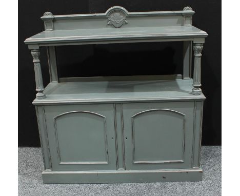 A Victorian painted buffet sideboard, the upper moulded rectangular tier with arched half-gallery centrally applied with a sw