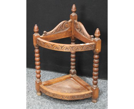 A 17th century style oak corner walking stick/umbrella stand, bobbin-turned supports, 80cm high