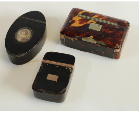An early 19th century tortoiseshell navette shaped snuff box, hinged cover set with a portrait miniature; others (3)