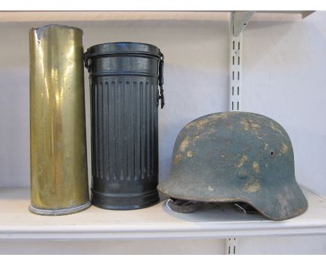 WW2 German Helmet with original paint and leather liner, WW2&nbsp;German gas mask case and WW2 shell case (3)Condition Report