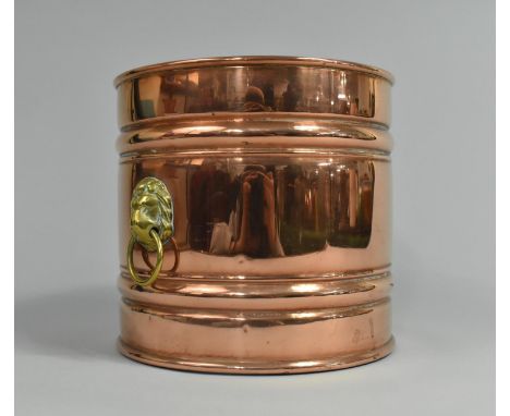 A Modern Copper and Brass Cylindrical Planter with Lion Mask Ring Handles, 16cms Diameter and 16cms High 