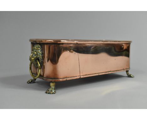 A Rectangular Copper Planter with Brass Lion Mask Ring Handles and Four Claw Feet, 29cms by 12cms 