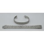 2 Damenarmbänder je WG 18ct.