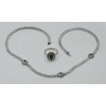 1 Damenring WG 18ct. wohl mit ovalem Smaragd
