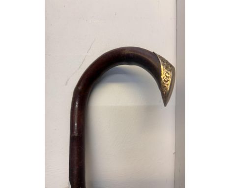Walking stick with gold plated top 