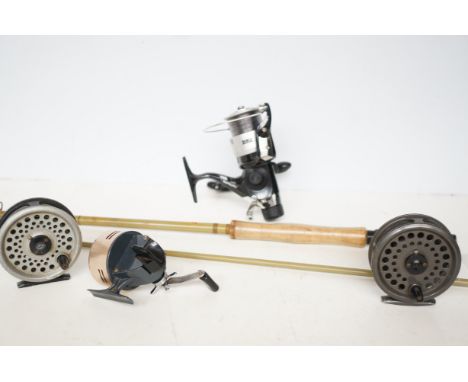 4x Fishing reels together with a split cane fishing rod 