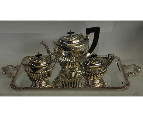 A silver plated three piece boat shaped tea service, stop fluted, chased and engraved, Jordan Collection, Sheffield; a simila