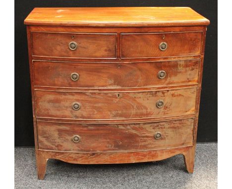 A late Victorian mahogany bow-fronted chest of drawers, in the George III taste, slightly oversailing top above two short and