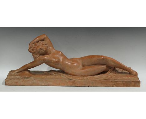 After Bouraine, a French Art Deco style terracotta model of a reclining scantiliy draped nude, signed in the maquette, steppe