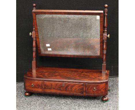 A George III design dressing mirror, rectangular plate, ring-turned supports, the base with three small drawers, bun feet, 52