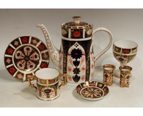 A Royal Crown Derby 1128 pattern coffee pot, goblet, two handled loving cup, pair of miniature vases, trinket dish and tea pl