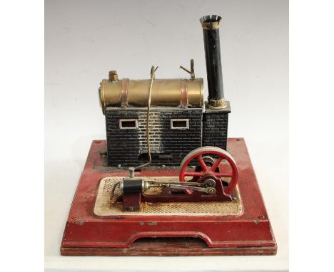 A Bing tinplate tinplate live steam model stationery engine, copper-bound brass tank, 30cm wide overall, early 20th century
