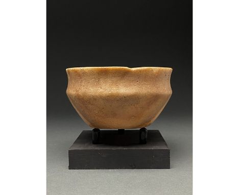 CA. 2000 BC Egyptian. A large crème coloured steatite bowl comprising a carinated body, a flat base and a thin slightly out-t