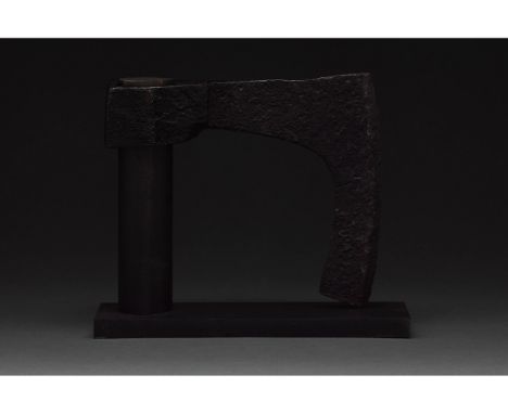 c. 900-1100 AD. Viking age. An iron bearded axe head with an elongated, heavy blade and a round socket. The bearded axe, or S
