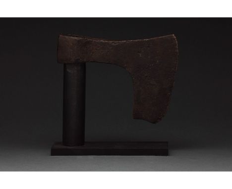 c. 900-1100 AD. Viking age. An iron bearded axe head with an squat, heavy blade and a round socket. The bearded axe, or Skegg