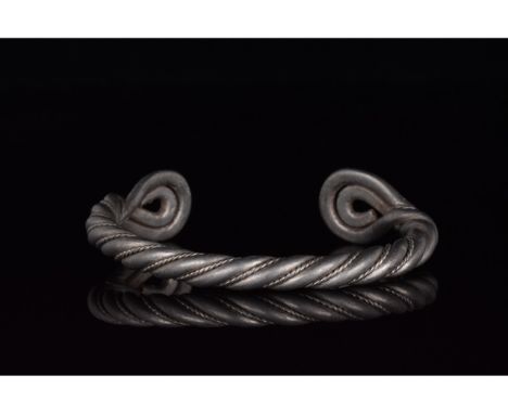 700-1100 AD, Viking Age. A heavy silver twisted bracelet comprised strands of silver woven together, with applied granulation