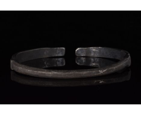 700-1100 AD, Viking Age. Beautiful silver bracelet with elongated terminals which feature two grooves ornamented with a ‘scal