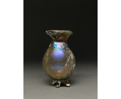 C. 400 AD Roman. A beautiful light green flask comprising a slightly globular body, a short flaring neck, and a wide flaring,