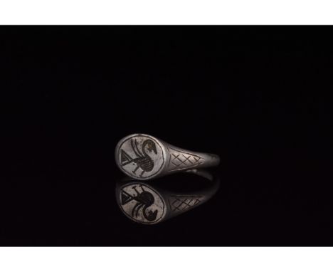 700-1100 AD. Viking Age. A silver ring with D-shaped hoop with incised hatching decoration on the shoulders, and flattened, e