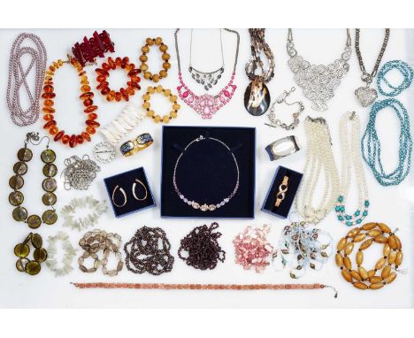 A LARGE QUANTITY OF COSTUME JEWELLERY, including gemstone and cultured pearl necklaces; cased Swarovski jewellery; a cased Tr