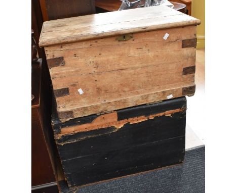 An early 20th Century pine tool/blanket box, along with early 20th Century black trunk